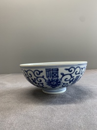 A Chinese blue and white 'fu and shou' bowl with flower scrolls, Yongzheng mark and of the period
