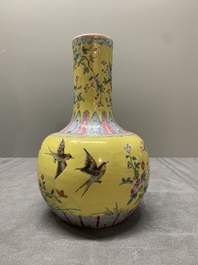 A Chinese famille rose yellow-ground bottle vase, Bao Shan Zhai 寶善斎 mark, 19th C.