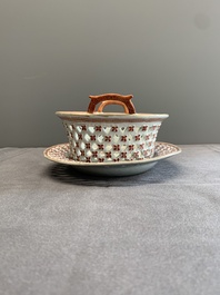 A Chinese openworked famille rose 'antiquities' basket and stand, Qianlong