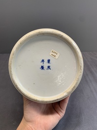 Two Chinese blue and white 'prunus on cracked ice' vases and covers, Kangxi mark, 19th C.