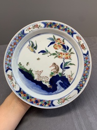 A pair of Chinese wucai ko-sometsuke 'monkey and deer' plates for the Japanese market and a tomobako, Chenghua mark, Chongzhen