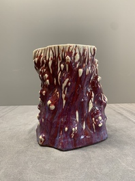 A Chinese flamb&eacute;-glazed trunk-shaped brush pot, 19th C.