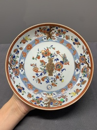 A Chinese famille rose 'antiquities' dish and two plates, Yongzheng/Qianlong