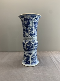 Two Chinese blue and white 'gu' vases with landscape and floral panels, Kangxi