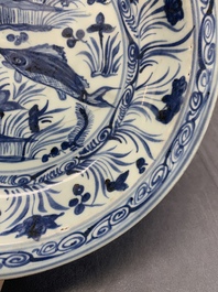 A rare Chinese blue and white 'fish swimming in a lotus pond' dish, Hongzhi/Zhengde