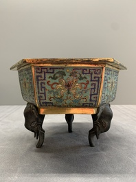 A pair of Chinese cloisonn&eacute; 'lotus and elephant' jardini&egrave;res, 18/19th C.