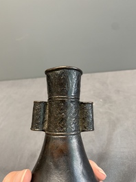 A Chinese bronze 'touhu' vase, Yuan