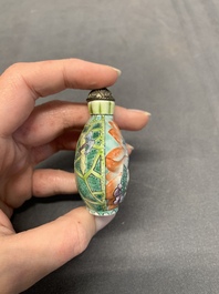 Three Chinese famille rose snuff bottles and two painted glass snuff bottles, Qianlong and Jujiutang mark, 19/20th C.