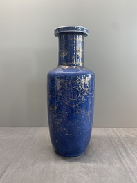 A Chinese gilt-decorated powder blue 'dragon and phoenix' rouleau vase, Kangxi