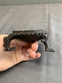 A rare Chinese bronze incense burner and cover in the shape of Liu Hai and a three legged toad, Ming