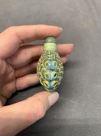 A Chinese blue and white 'dragon' snuff bottle and a polychrome 'peacock' snuff bottle, Yongzheng mark, 19/20th C.