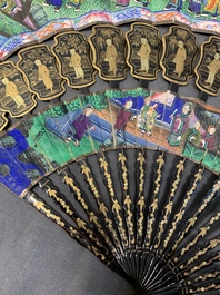 Two Chinese Canton gilt-lacquered and painted paper fans, one with original box, 19th C.