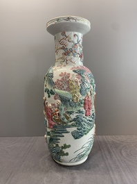 A pair of Chinese famille rose '18 luohan' vases with relief design, 19th C.