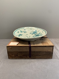 A Chinese Swatow turquoise- and black-enamelled 'carp, narcissus and chrysanthemum' plate and a tomobako, Ming