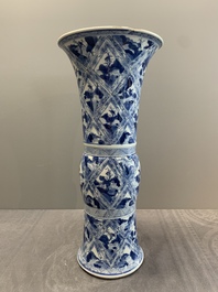 A Chinese blue and white 'landscape' 'gu' vase, Kangxi