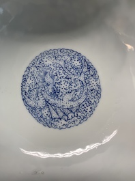 A pair of Chinese famille rose eggshell bowls with floral design, Qianlong mark, 20th C.
