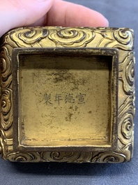 A Chinese square gilt bronze ink box and cover (印泥盒), Xuande mark and possibly of the period