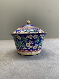 A pair of Chinese Canton enamel bowls and covers with floral design, Qianlong