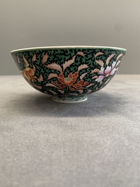 A Chinese black-ground famille rose 'flower scroll' bowl, Qianlong mark and of the period