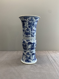 Two Chinese blue and white 'gu' vases with landscape and floral panels, Kangxi
