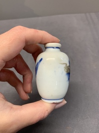 Four Chinese blue, white and copper-red snuff bottles, Yongzheng and Qianlong mark, 19th C.