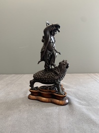 A rare Chinese bronze incense burner and cover in the shape of Liu Hai and a three legged toad, Ming