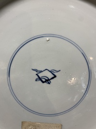 A Chinese blue, white and copper-red powder blue-ground 'peony' dish, Kangxi