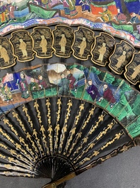 Two Chinese Canton gilt-lacquered and painted paper fans, one with original box, 19th C.