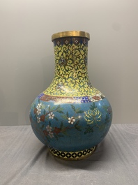 A pair of large Chinese cloisonn&eacute; 'magpies among flowering branches' vases, 19th C.