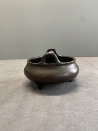 A Chinese bronze tripod censer, Xuande mark, 17/18th C.