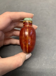 Four Chinese Peking glass, agate and jade snuff bottles, 19/20th C.