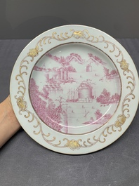A Chinese puce-enamelled and gilt-decorated 'harbour scene' plate, Qianlong