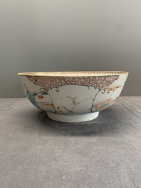 A Chinese Canton famille rose bowl with figures in a garden, Qianlong