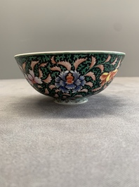 A Chinese black-ground famille rose 'flower scroll' bowl, Qianlong mark and of the period