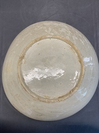 A Vietnamese or Annamese relief-molded blue, white and orange 'dragon' dish, 19th C.