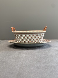 A Chinese openworked famille rose 'antiquities' basket and stand, Qianlong