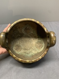 A Chinese gold-splashed bronze censer with wooden cover, Xuande mark, 17/18th C.