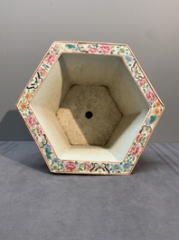 A Chinese Canton famille rose hexagonal jardini&egrave;re and stand with narrative design, 19th C.