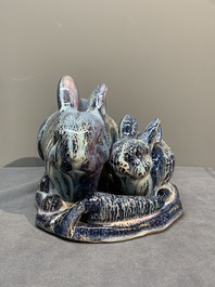 A Chinese Shiwan flamb&eacute; group of two rabbits, Cao Wenxuan 曹文選 and Jing De Zhen Zhi 景德鎮制 seal marks, 1st half 20th C.