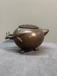 A Chinese bronze camel-form paperweight and a peach-shaped covered censer, 19th C.