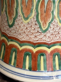 A Chinese wucai 'gu' vase with Buddhist lions, peony scrolls and figures, 19th C.