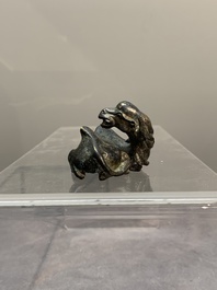 A Chinese bronze camel-form paperweight and a peach-shaped covered censer, 19th C.