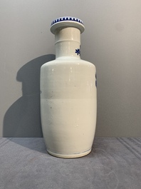 A Chinese blue and white vase with birds among flowering branches, 19th C.