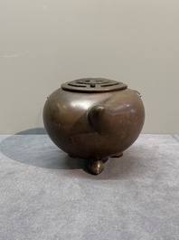 A Chinese bronze camel-form paperweight and a peach-shaped covered censer, 19th C.