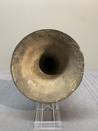 A Chinese archaistic bronze 'gu' vase with relief design, Ming