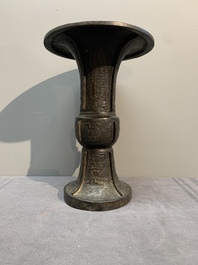 Two Chinese archaistic bronze vases with relief design, Ming