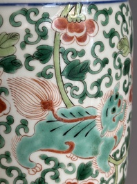 A Chinese wucai 'gu' vase with Buddhist lions, peony scrolls and figures, 19th C.