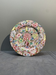 A Chinese famille rose 'millefleurs' dish and two plates, Qianlong and Jiu Jiang Jin Hua 九江錦華 mark, 20th C.