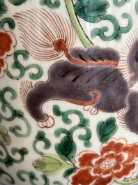 A Chinese wucai 'gu' vase with Buddhist lions, peony scrolls and figures, 19th C.
