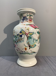 A Chinese famille rose 'warriors on horseback' vase, 18/19th C.